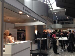 Busy acousticians grab a coffee next to the Ecophon booth. 