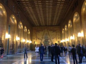 Acousticians in the Golden hall of the Stockholm City Hall 