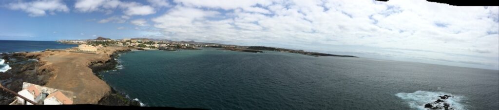 View from the top of the Lighthouse, looking back onto the main island of Praia. 